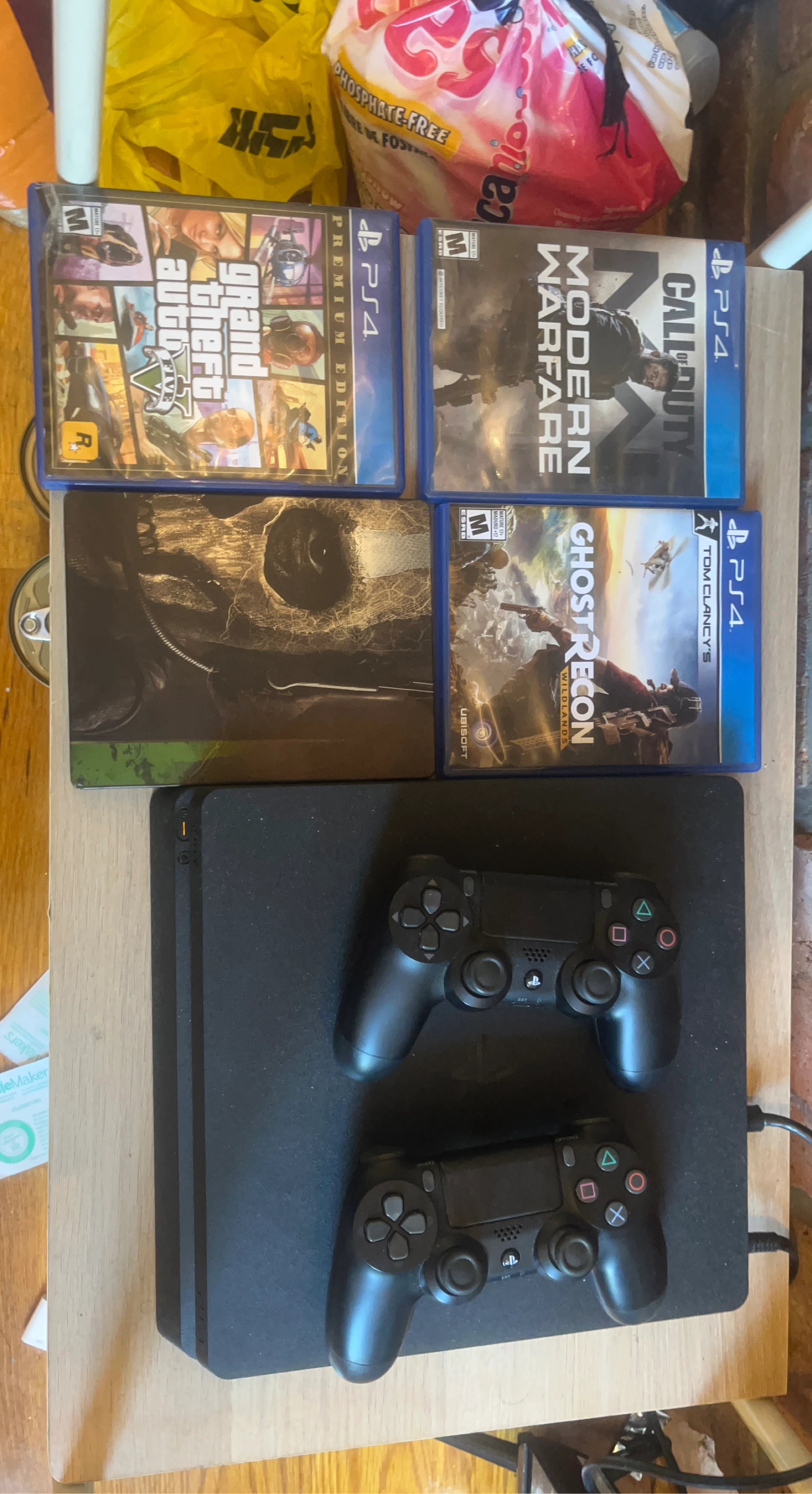 PS4 Slim Console with 3 Games and 2 Controllers