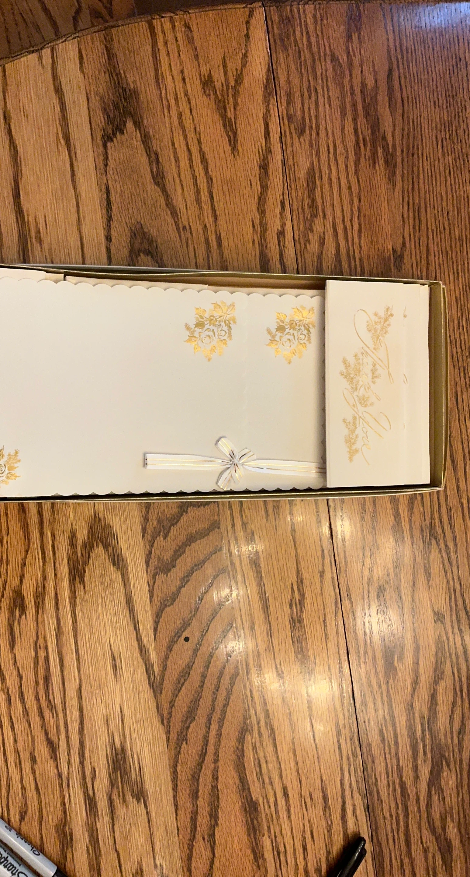 Set of stationery with gold floral accents