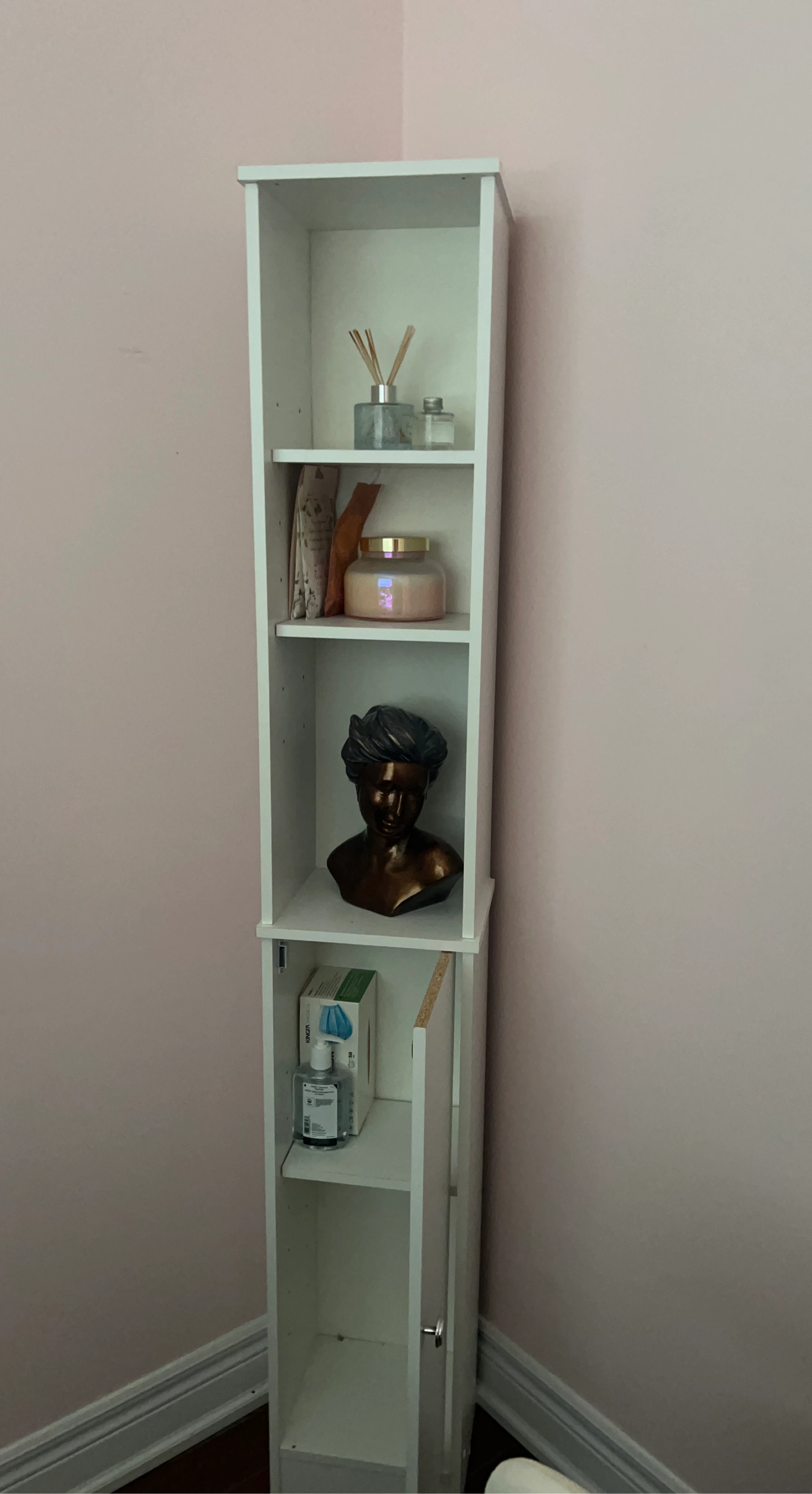 White narrow shelving unit