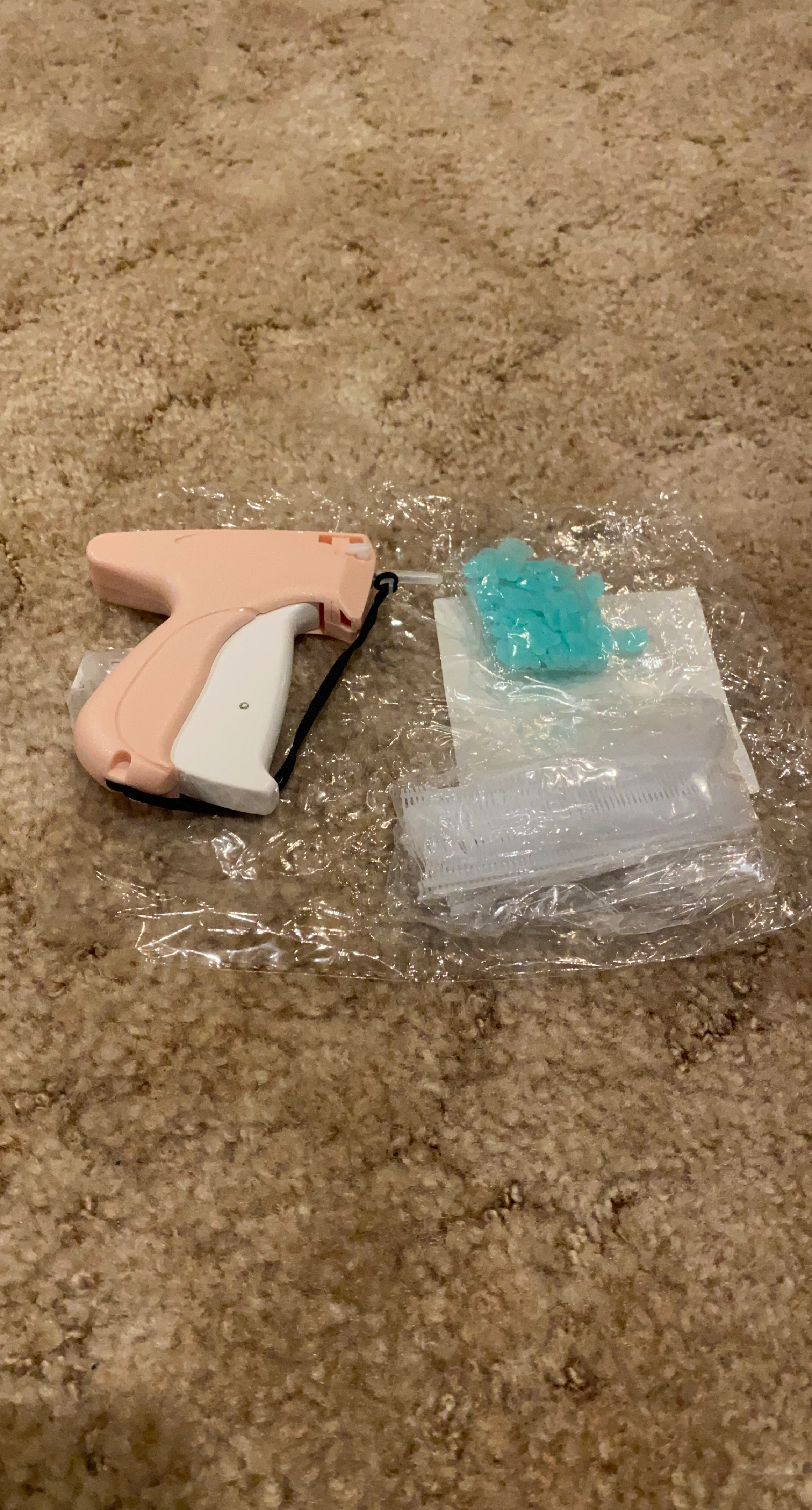 Pink and White Price Tagging Gun with Attachments