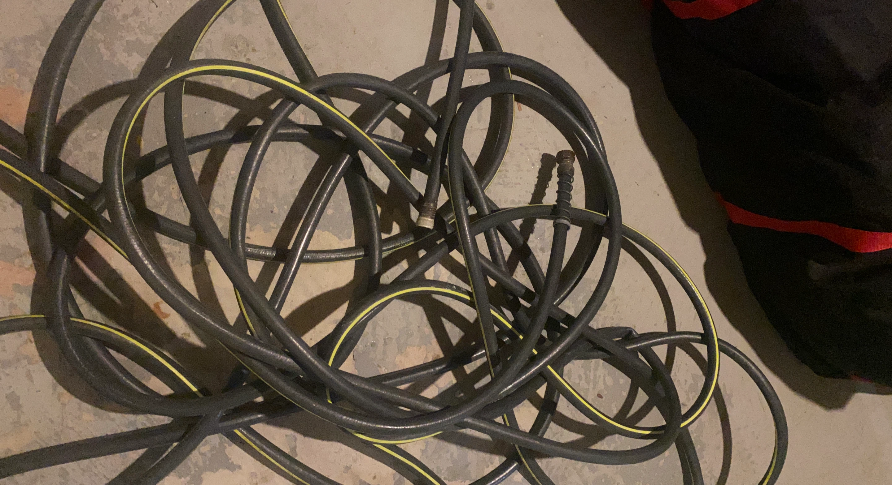 Black and yellow garden hose
