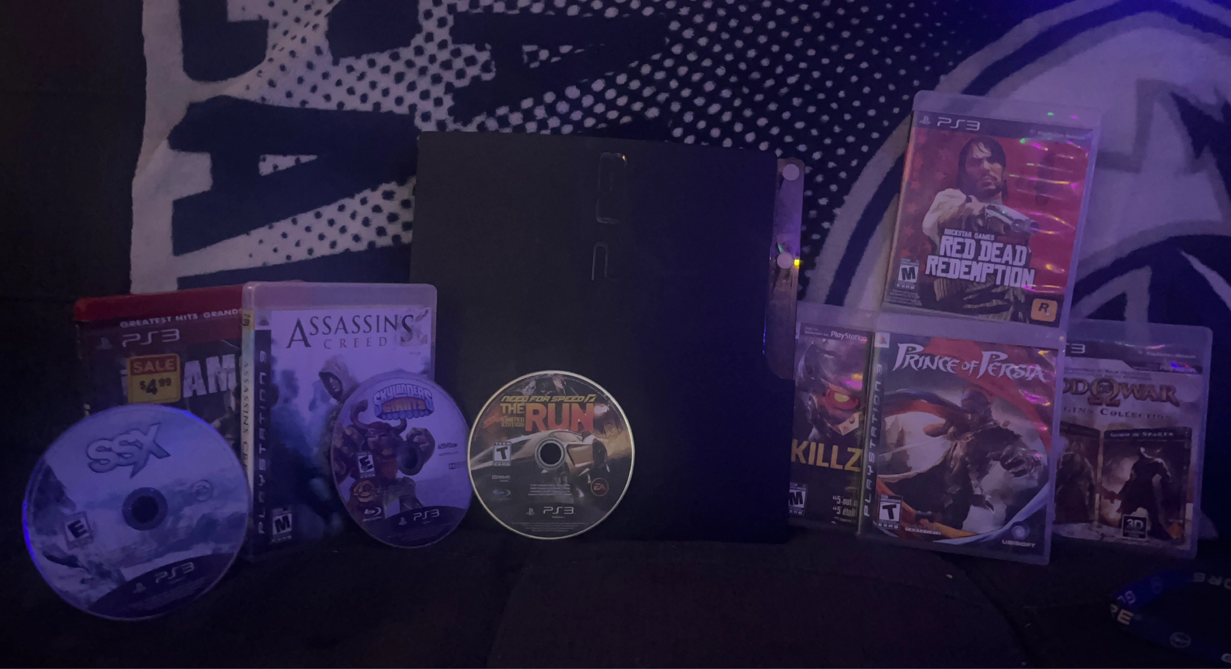 PlayStation 3 Console with 7 Games no controller