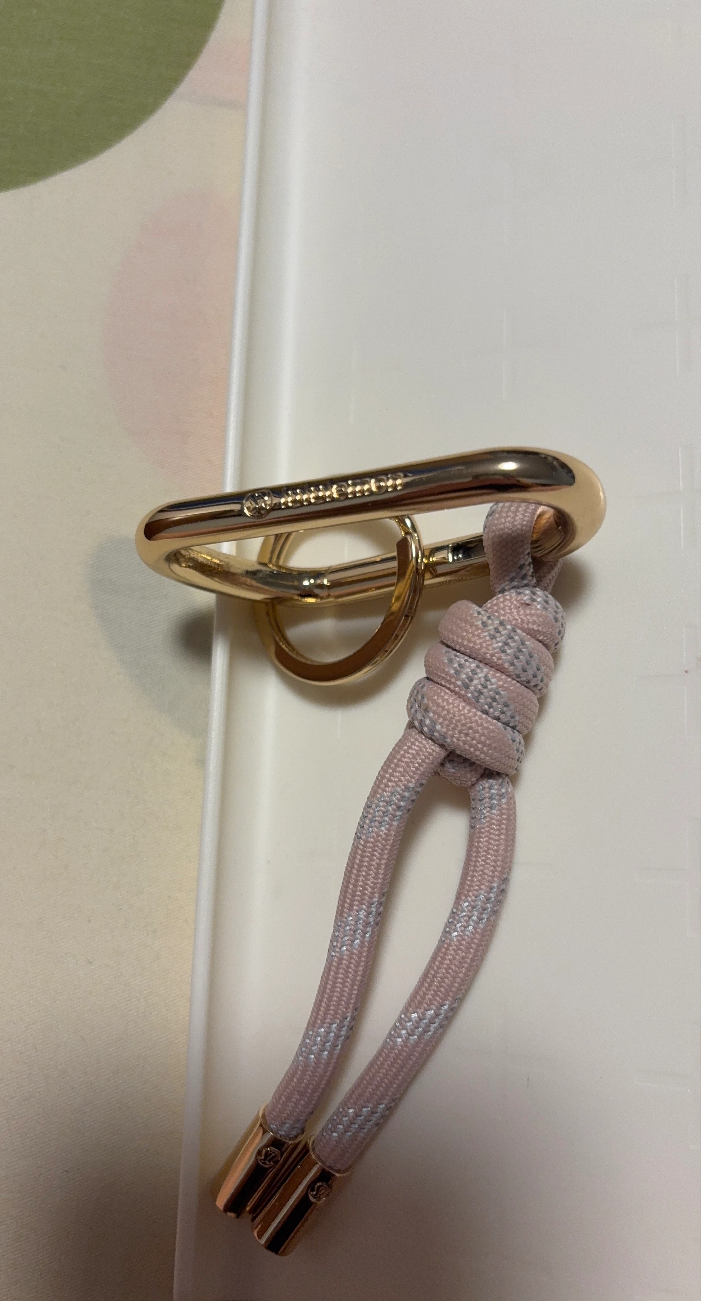 Lululemon Gold Keychain with Pink Rope Accent