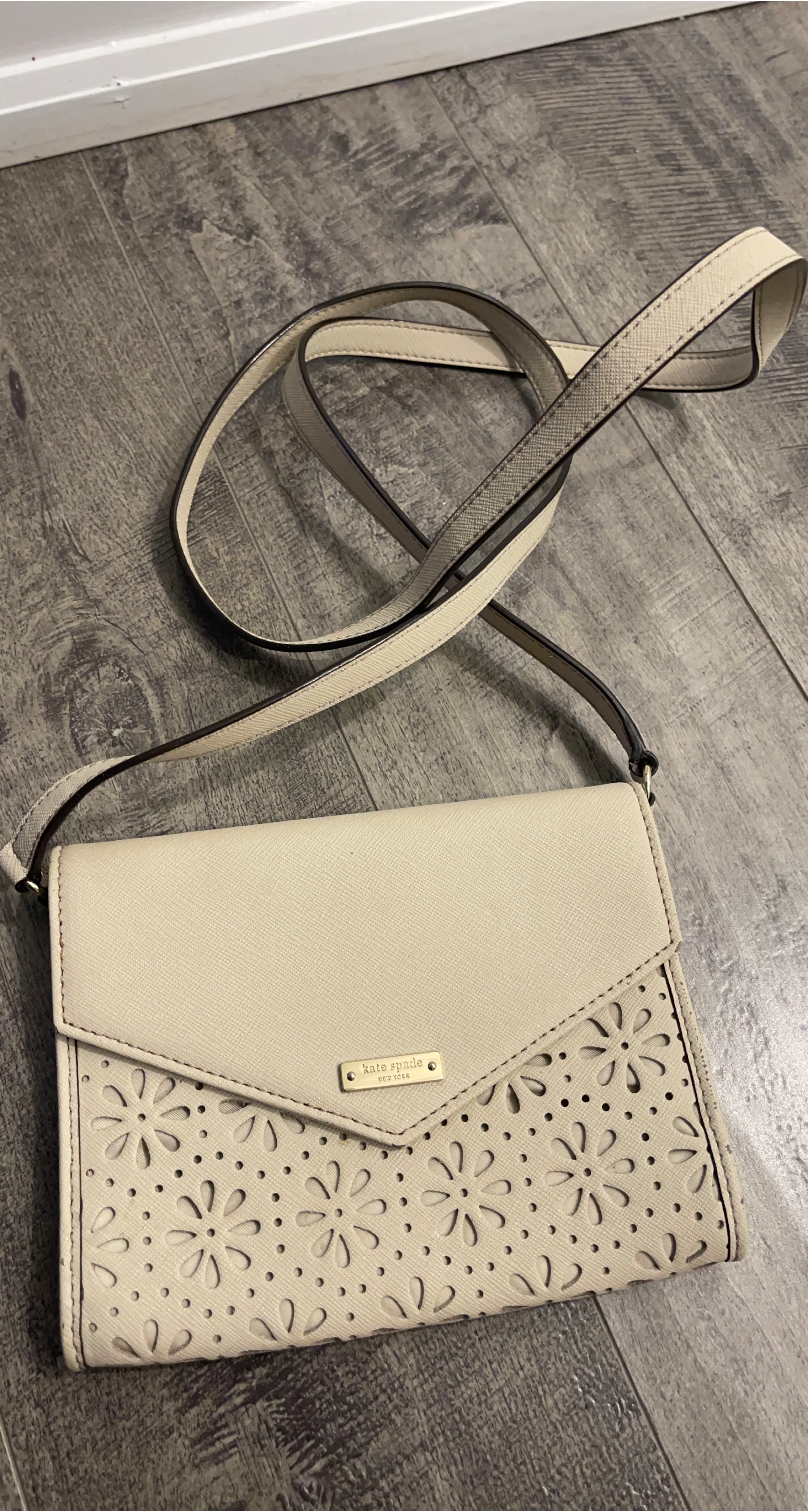 Kate Spade Cream Crossbody Bag with Flower Cutouts