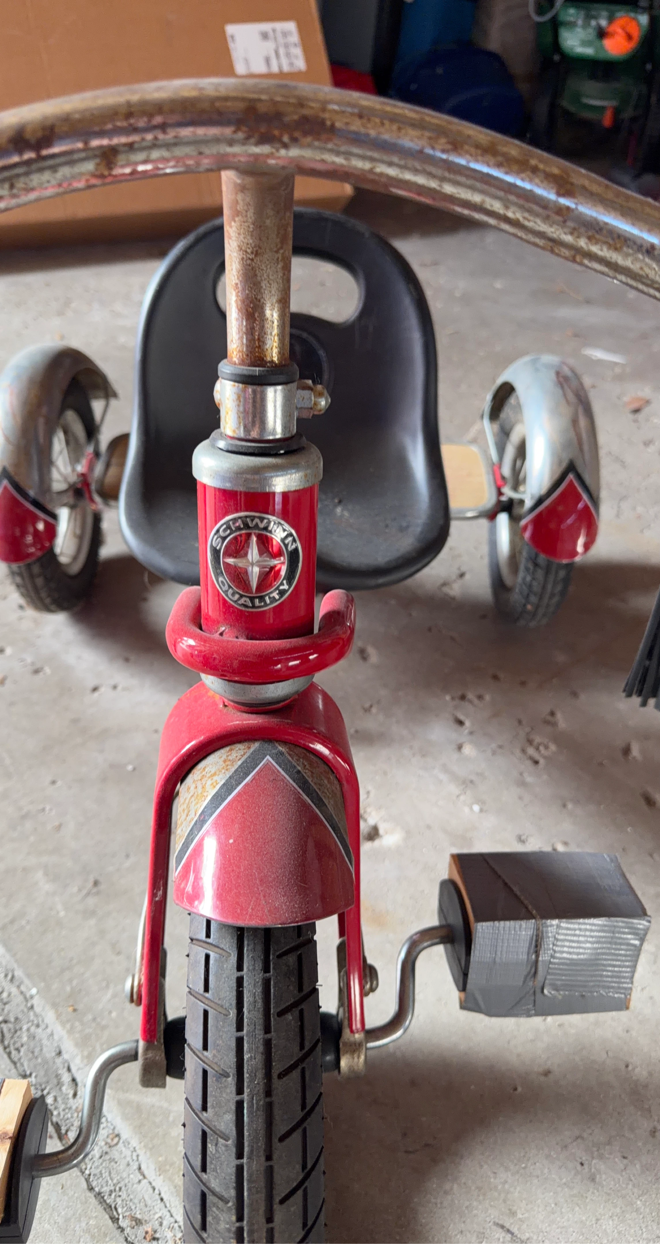 Red Schwinn Tricycle