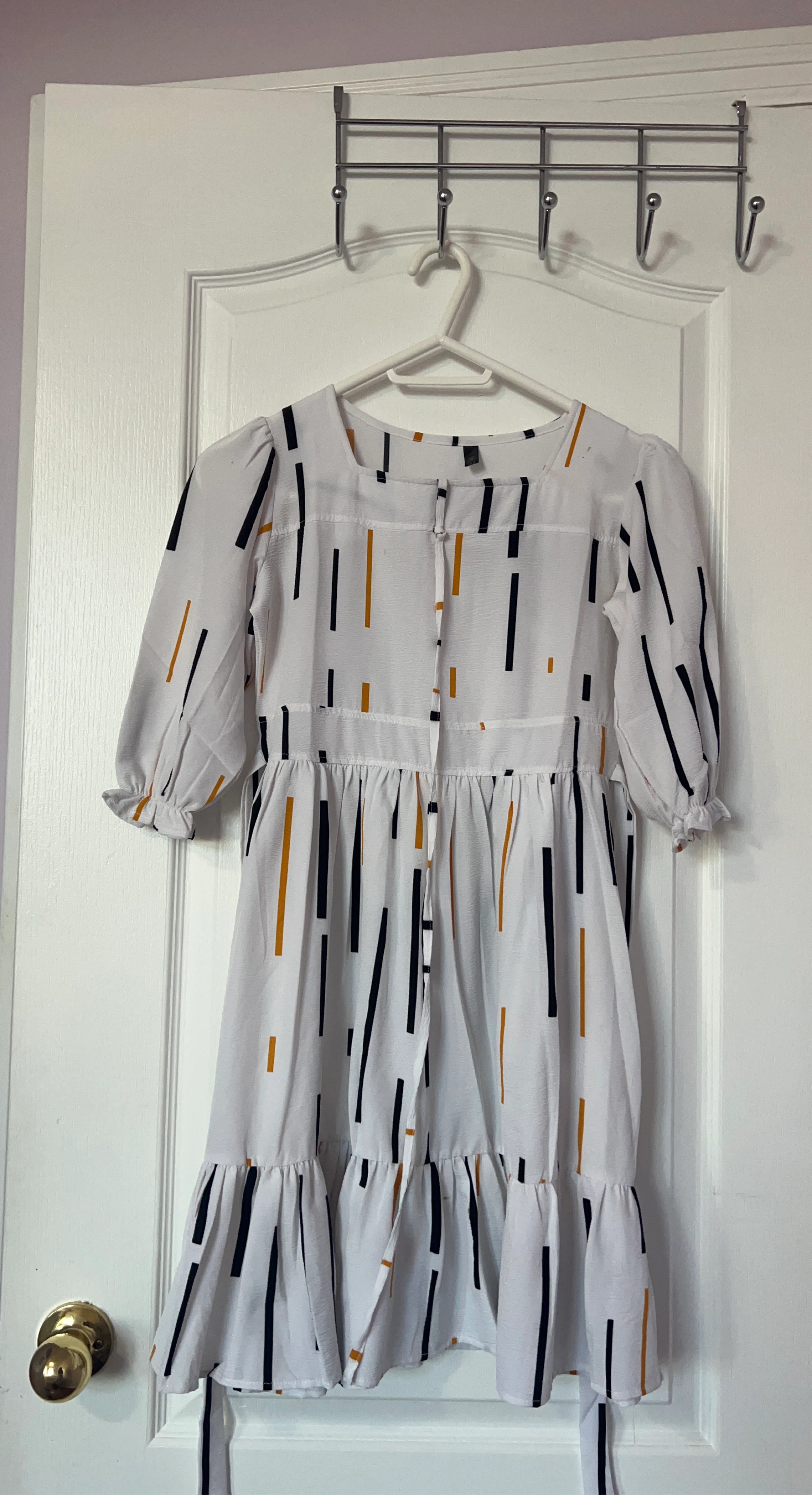 White Dress with Black and Orange Stripes