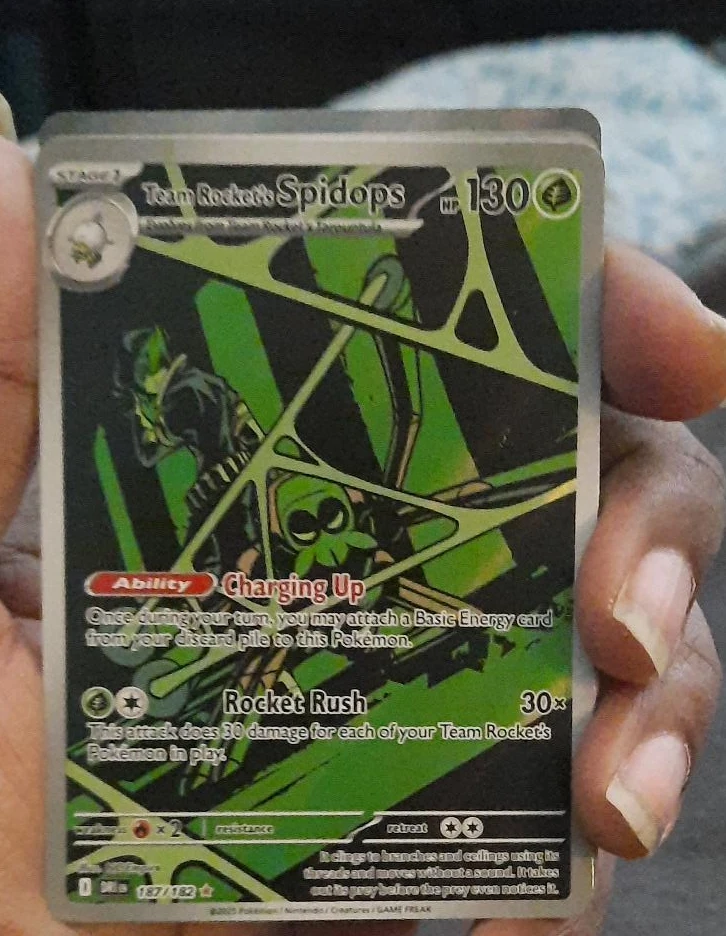 Team Rocket's Spidops Pokémon Card 187/182