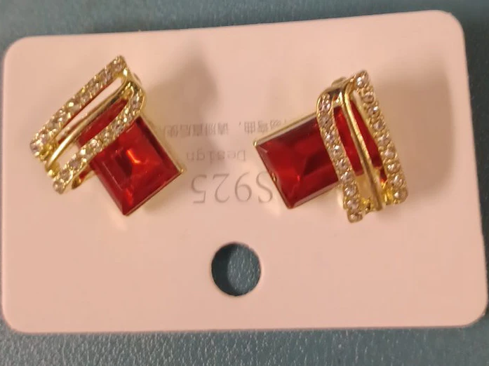 Gold Tone Earrings with Red Gemstones