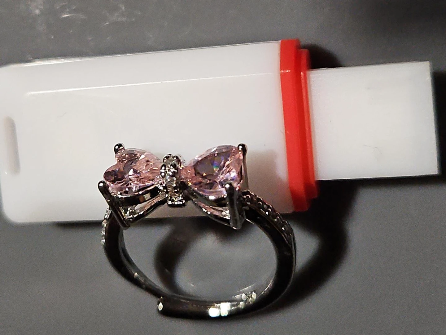 Silver Bow Ring with Pink Stones