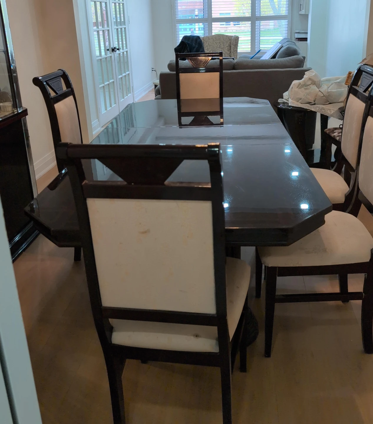 Dark wood dining table with 6 chairs