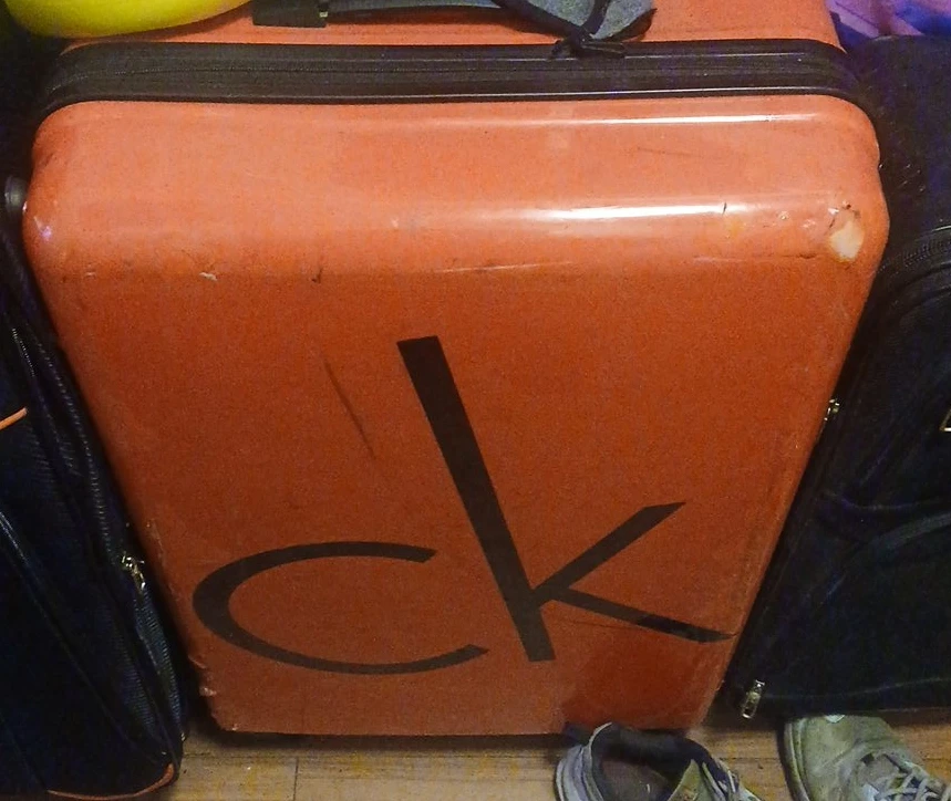 Calvin Klein CK Orange Hardshell Suitcase