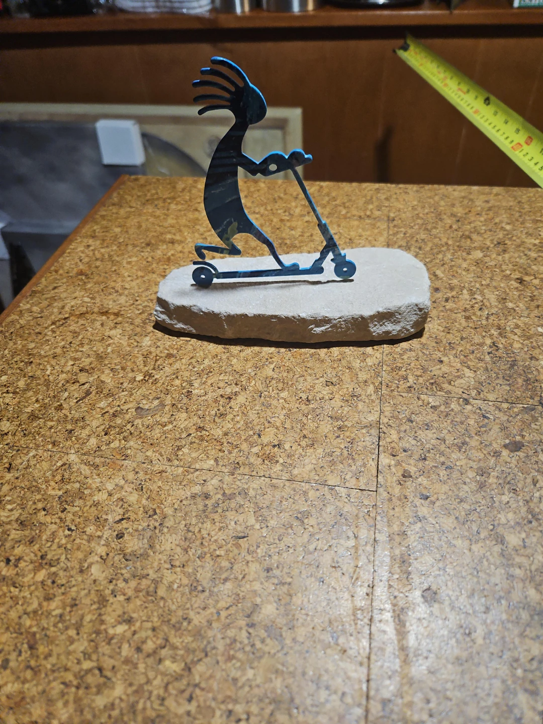 Kokopelli on Scooter Statue