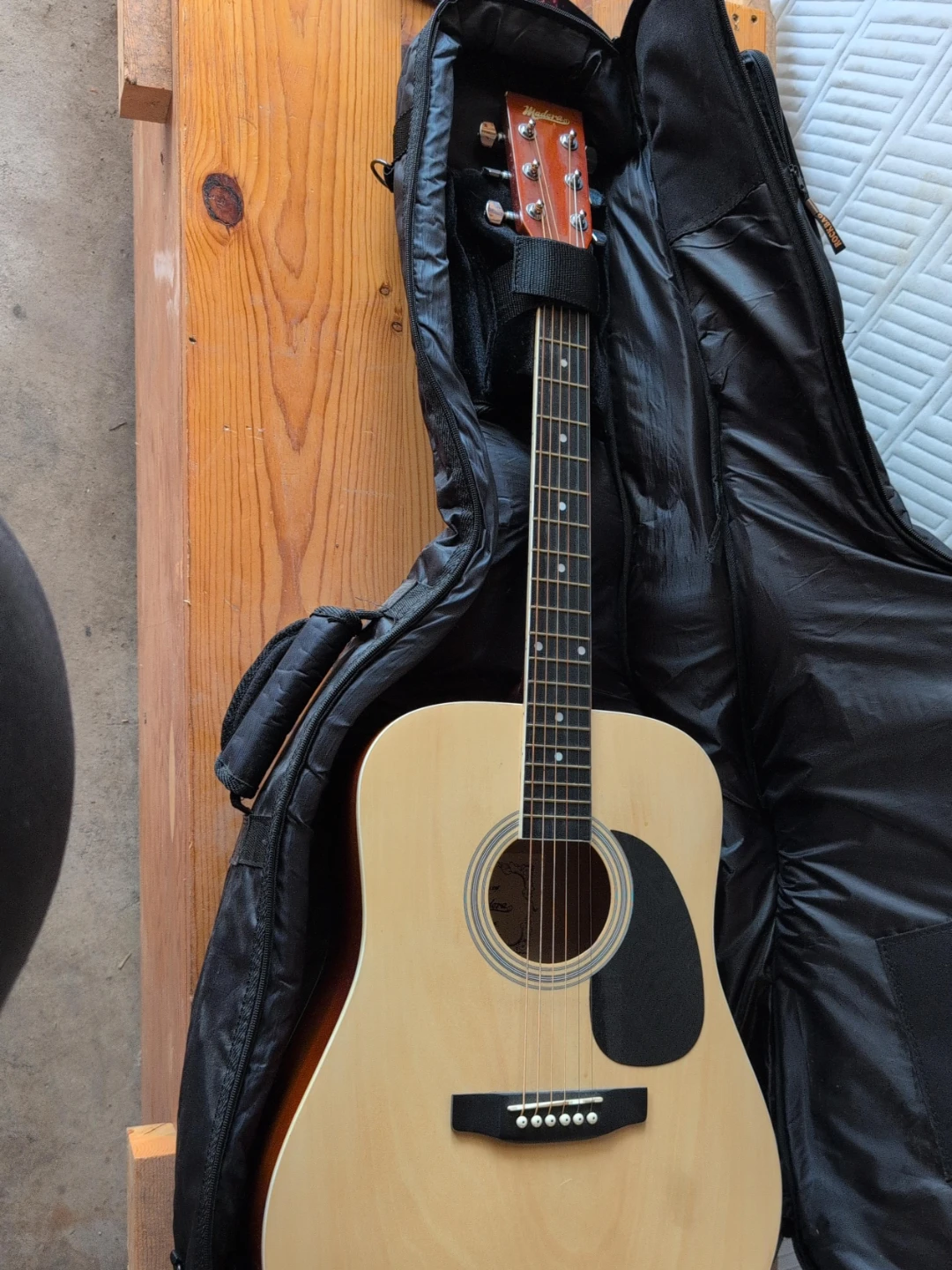 Madera Acoustic Guitar with rock bag carrier