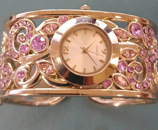 Women's Gold Tone Cuff Watch with Pink Rhinestones