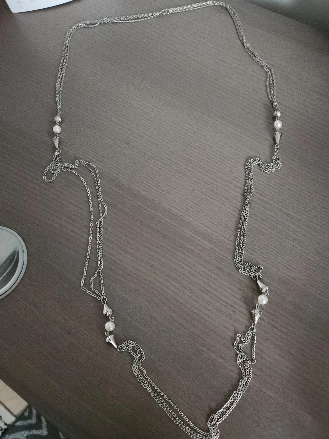 Silver tone layered necklace with faux pearls