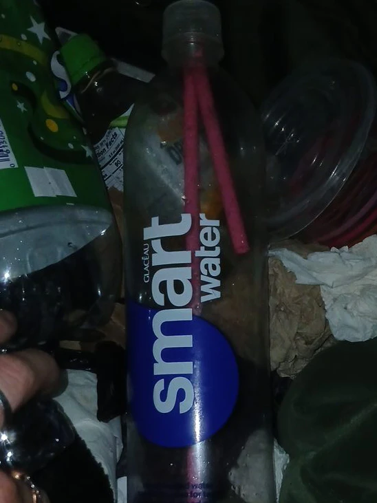Smartwater Bottle with Pink Straws