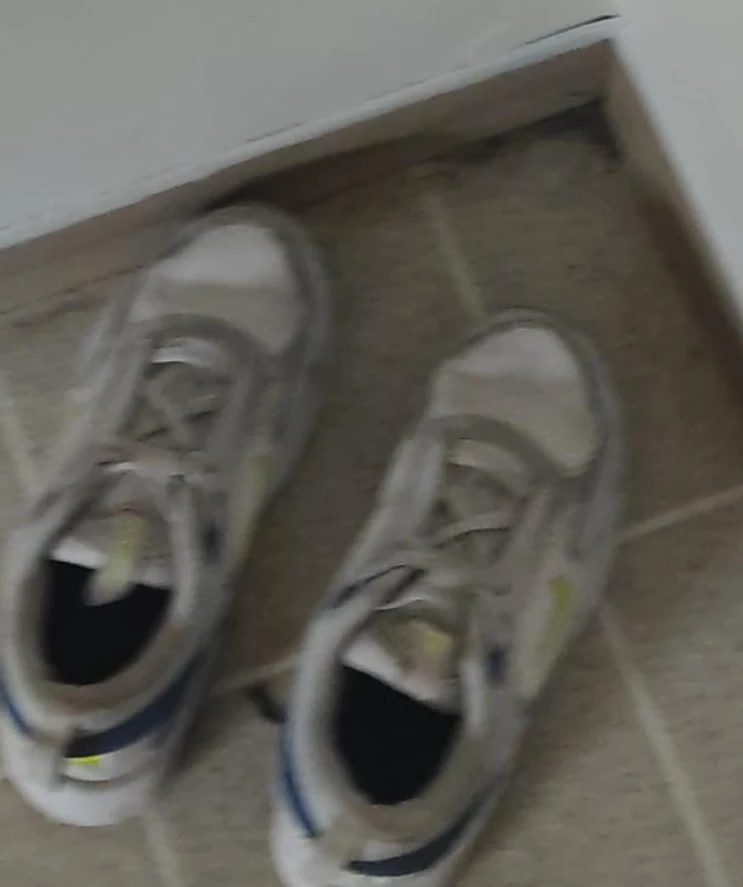 White and Blue Athletic Shoes