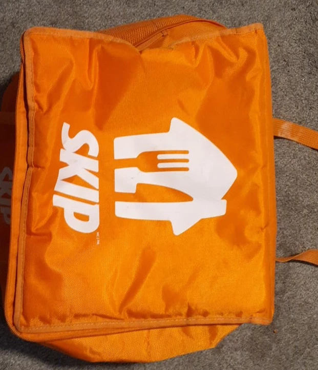 Orange SkipTheDishes insulated delivery bag
