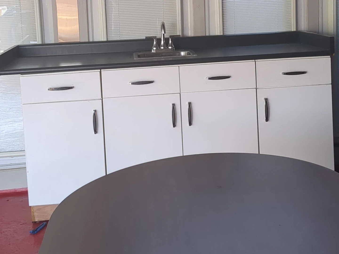 White Kitchen Cabinets with Sink and Faucet