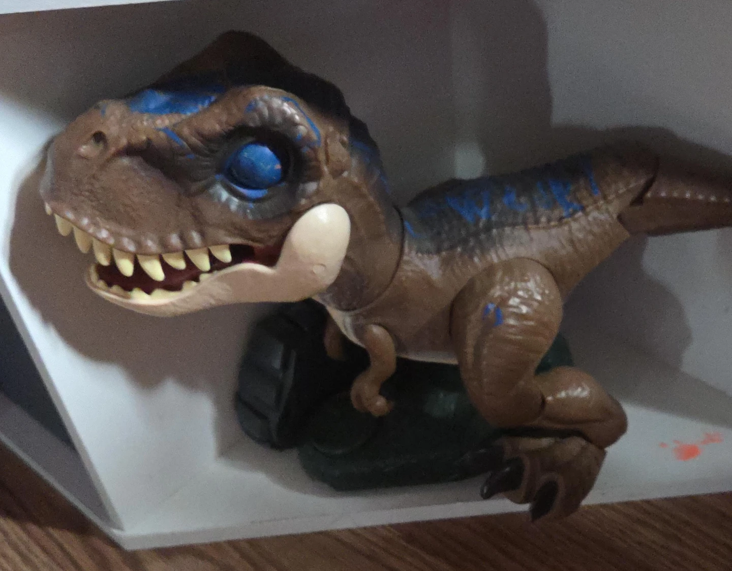 Brown and Blue Dinosaur Toy
