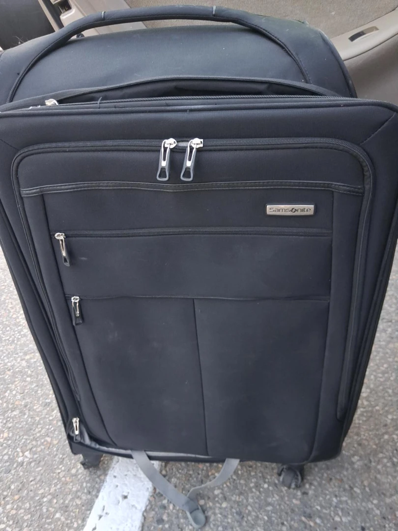 Samsonite Black Rolling Suitcase