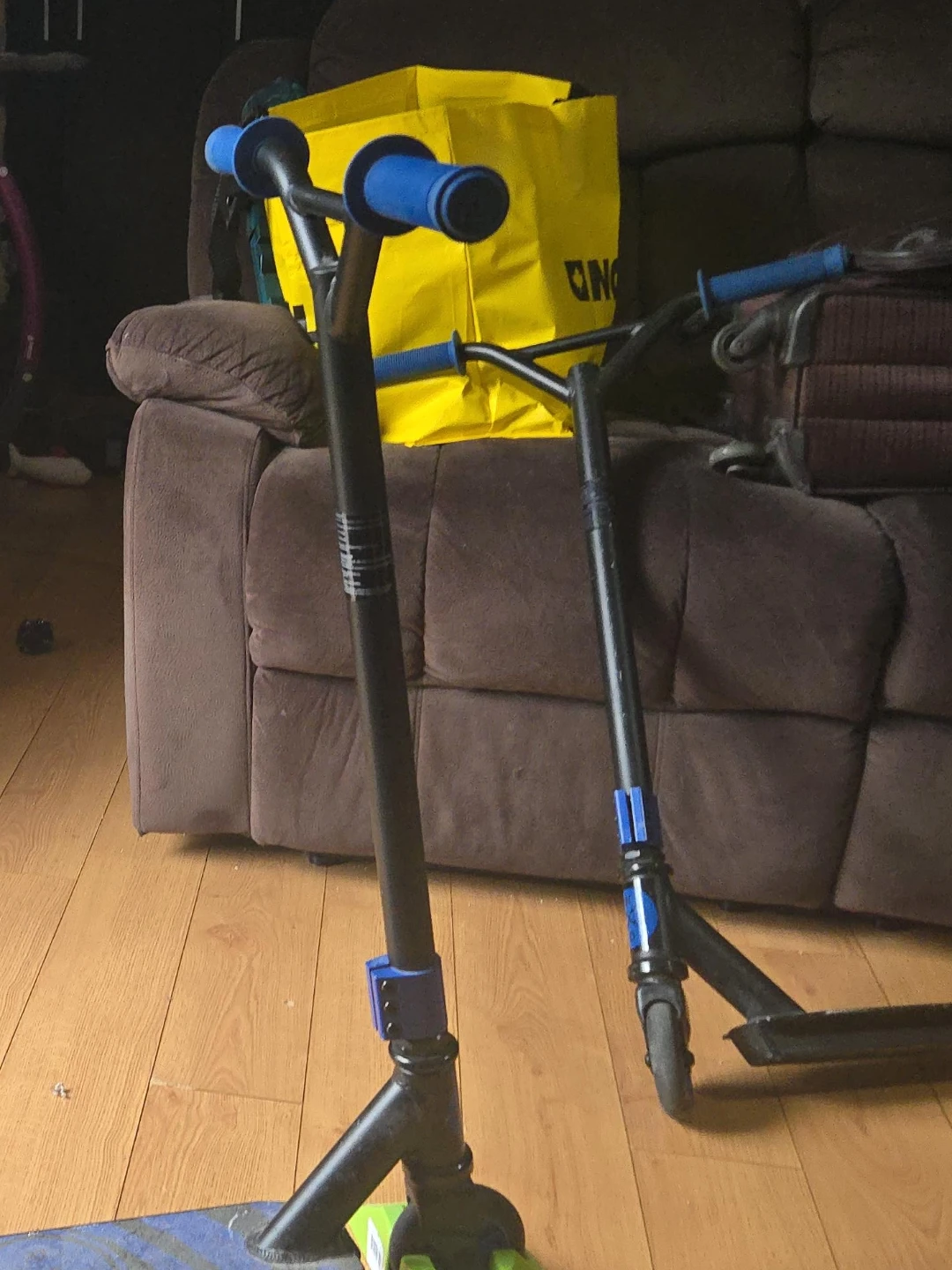 Two Blue and Black Scooters