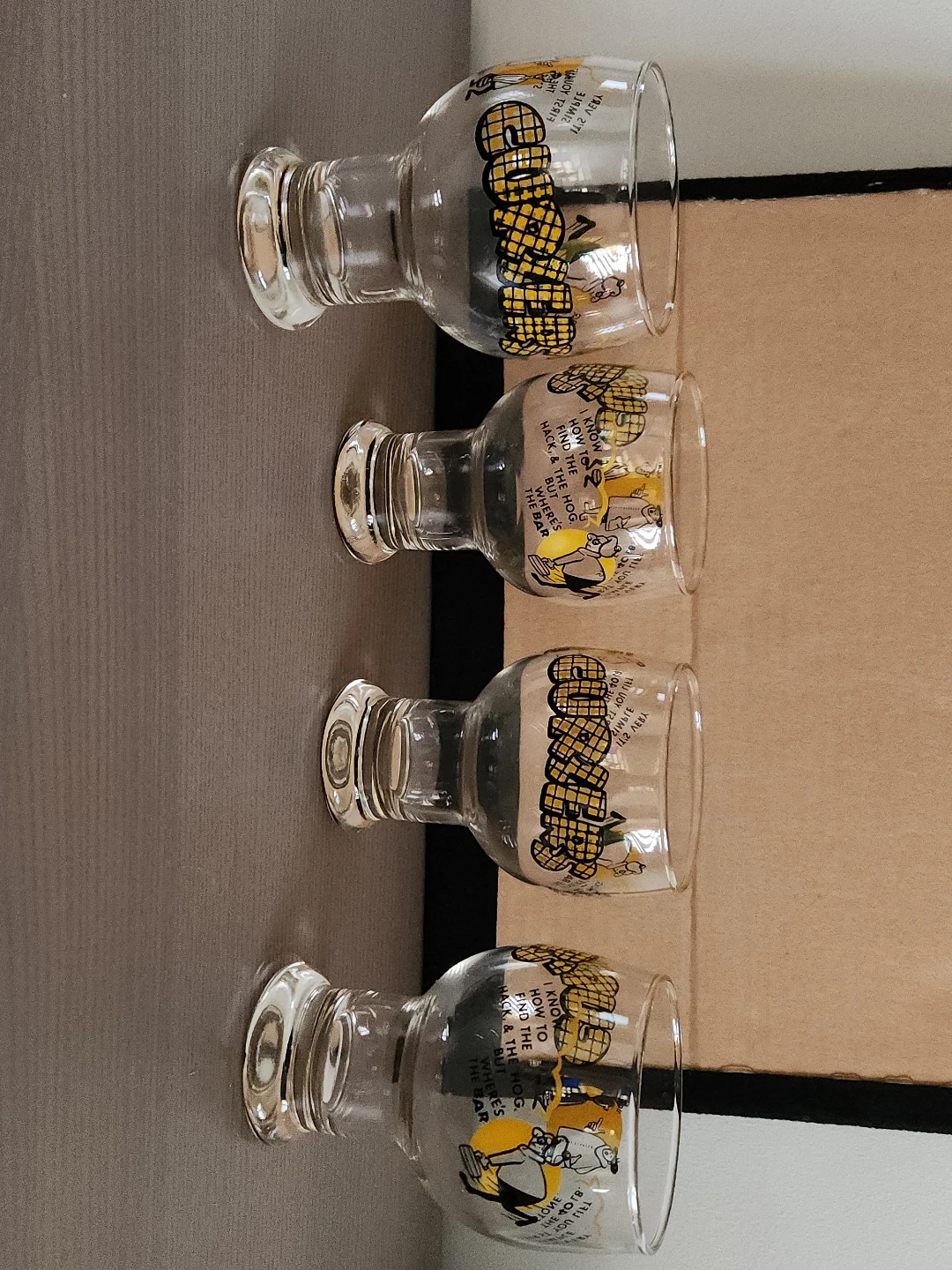 Set of 4 "Buzzer" Glasses with Cartoon Graphics