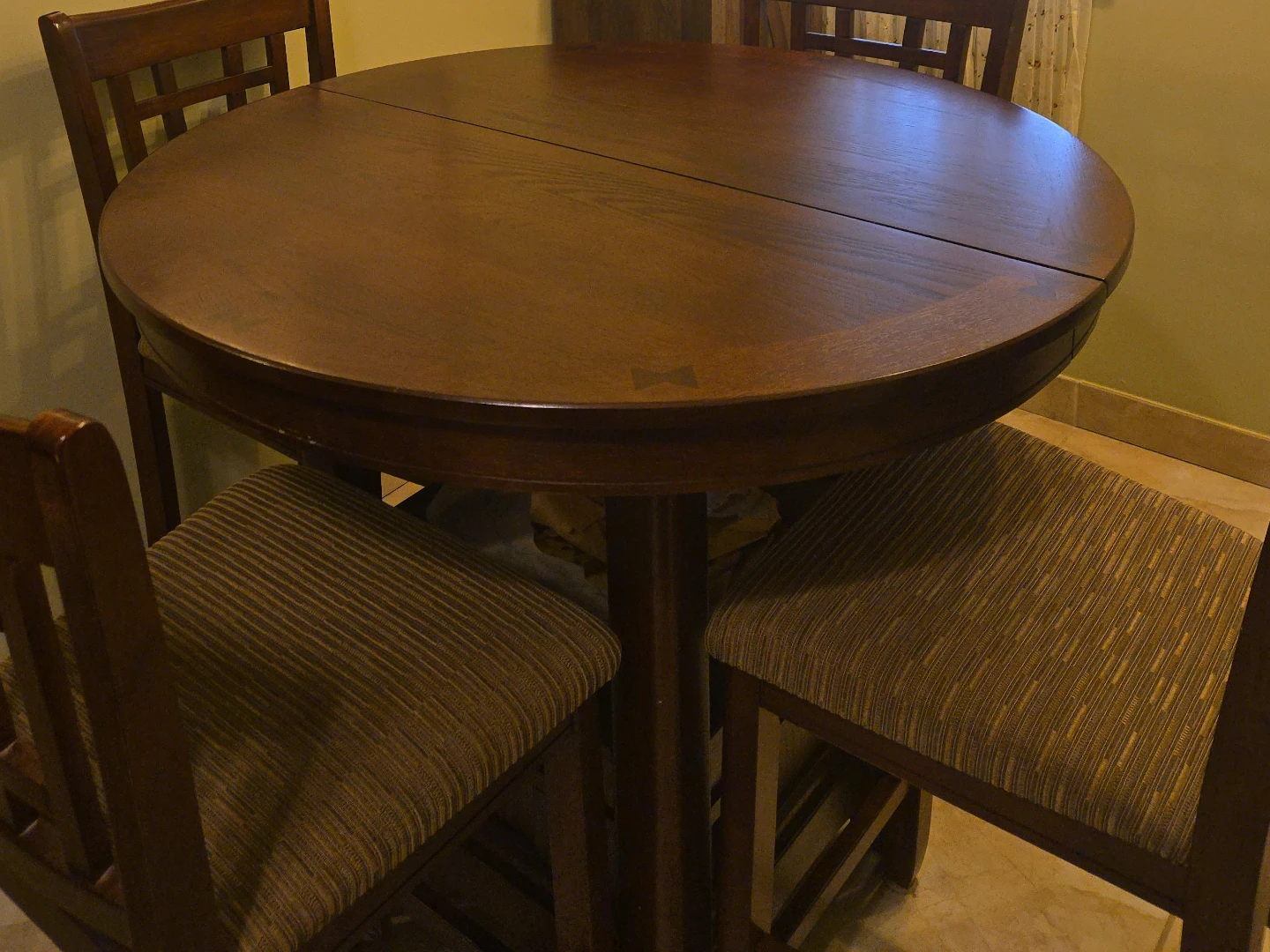 Round Drop Leaf Counter Height Table expandable with 4 Chairs