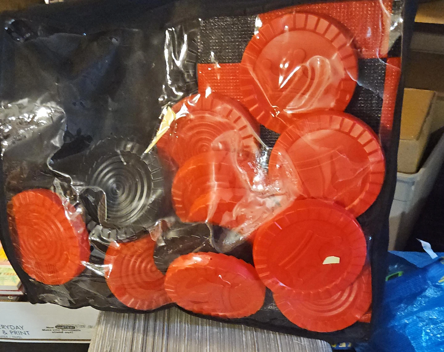 Red and Black Checkerboard Toss Game with Coins