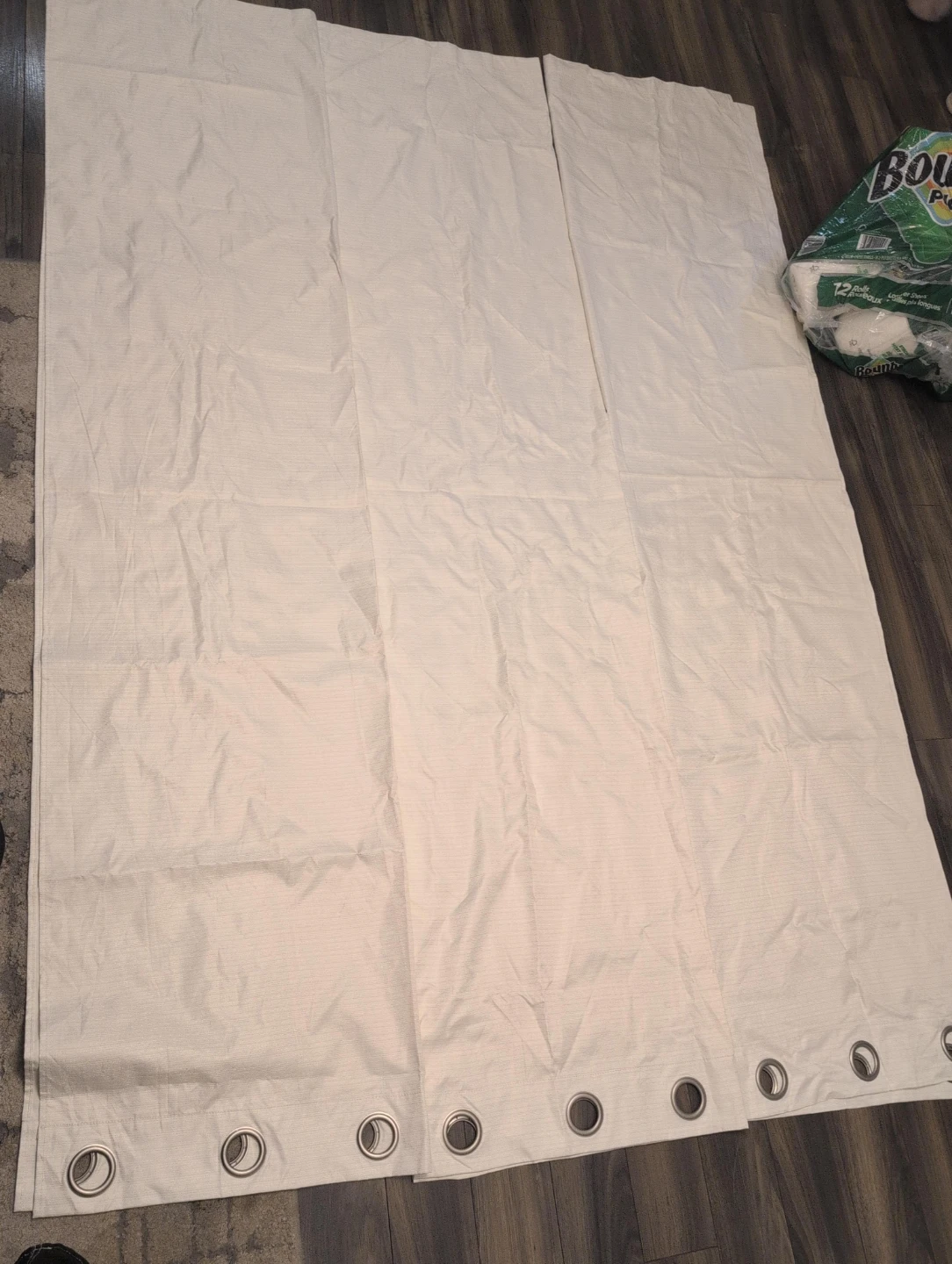 Pair of Cream Grommet Curtains