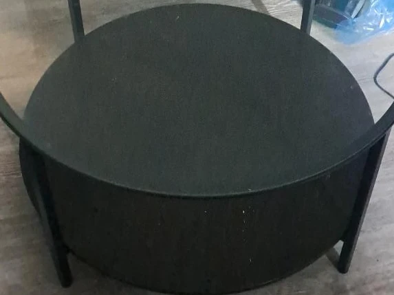 Round black metal side table