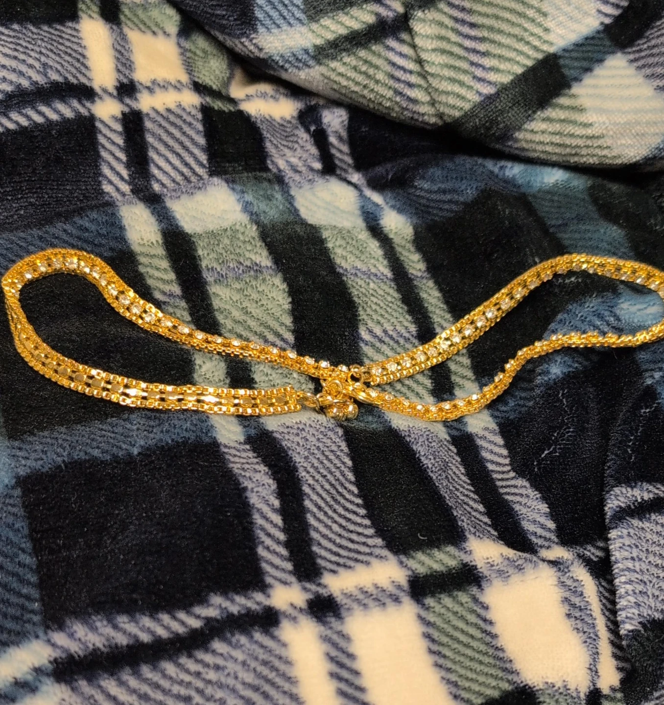 Gold coloured  ankle bracelet with stones