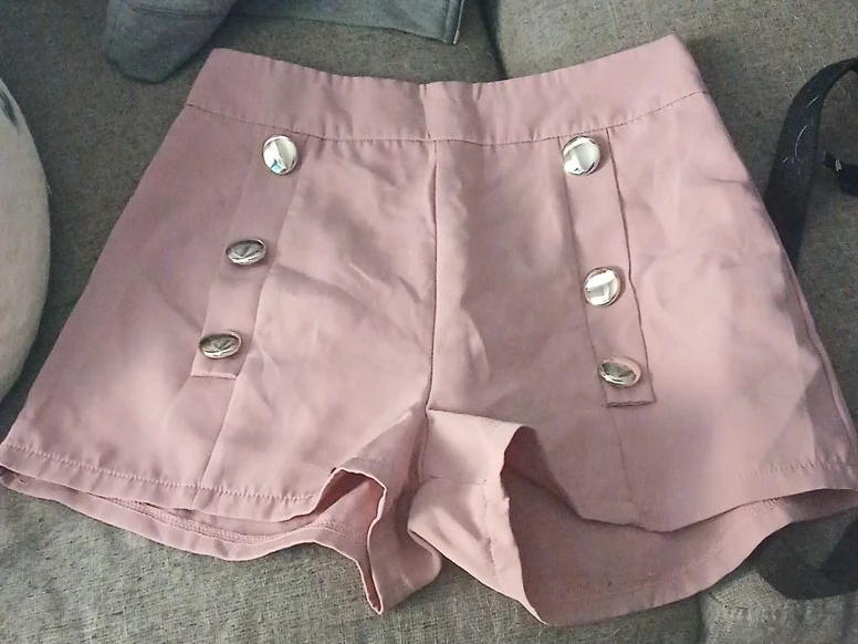 Women's pink button-up shorts