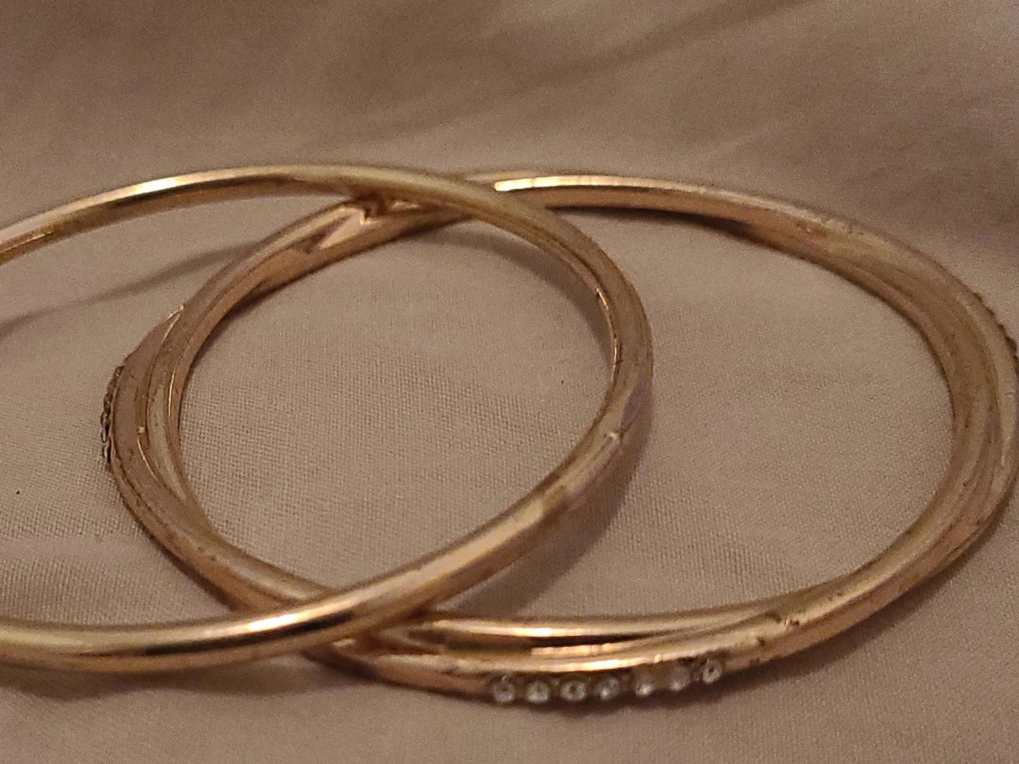 Gold tone bangles with rhinestones