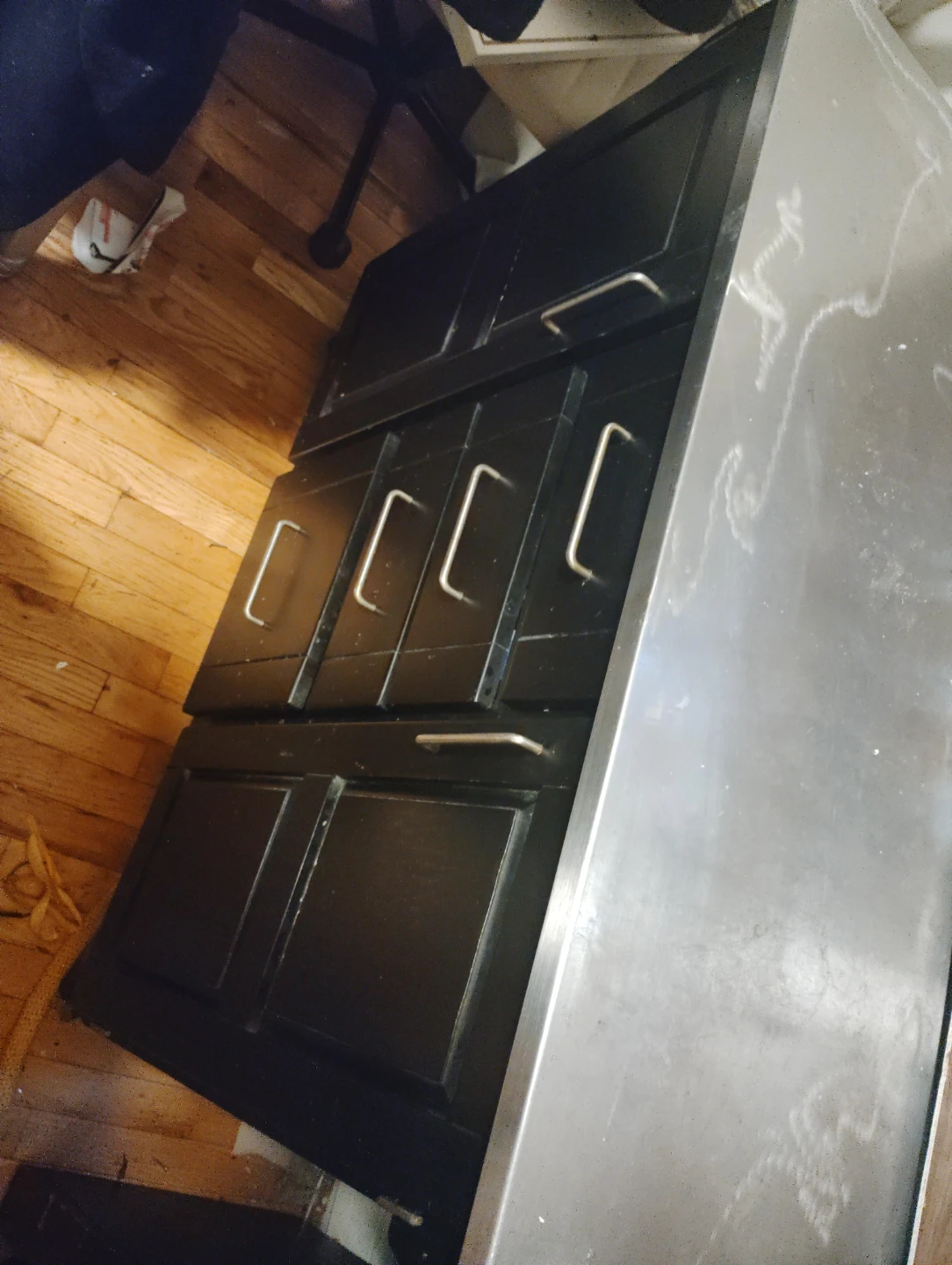 Black Kitchen Cabinet with Stainless Steel Countertop