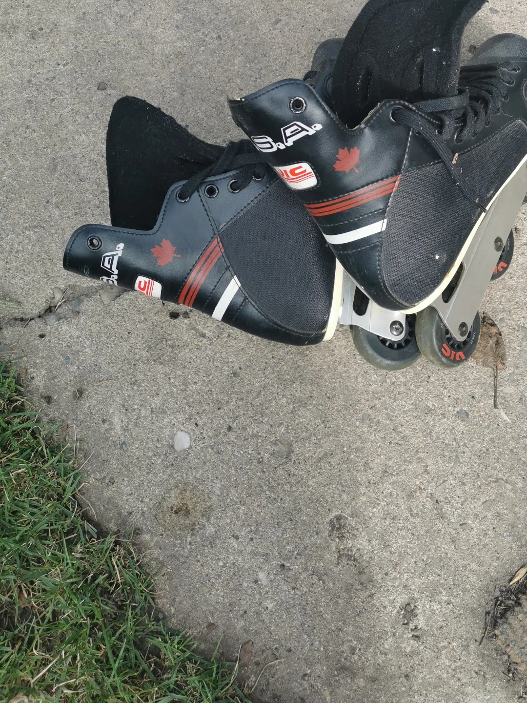 Black Inline Skates with Red and White Stripes - Size Unknown