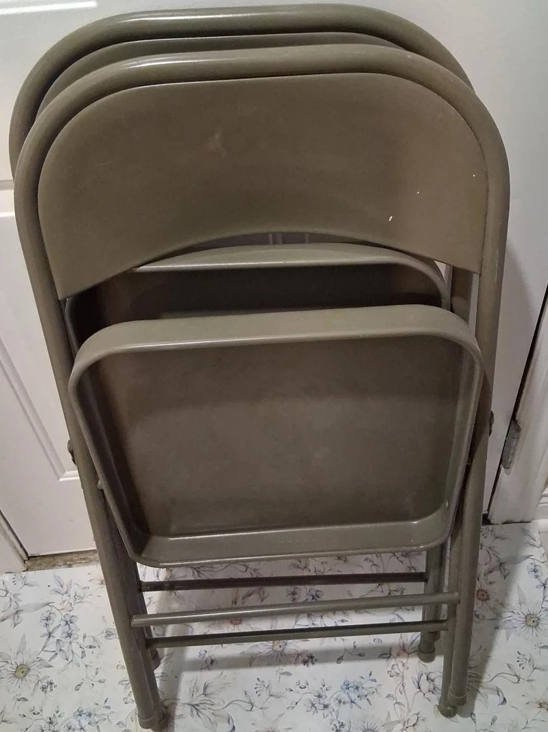 Two Stackable Metal Folding Chairs