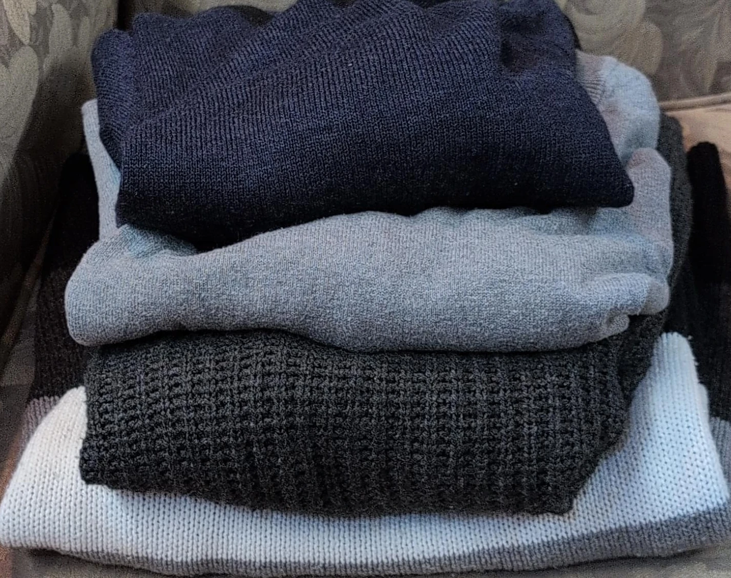 Stack of Men's Sweaters