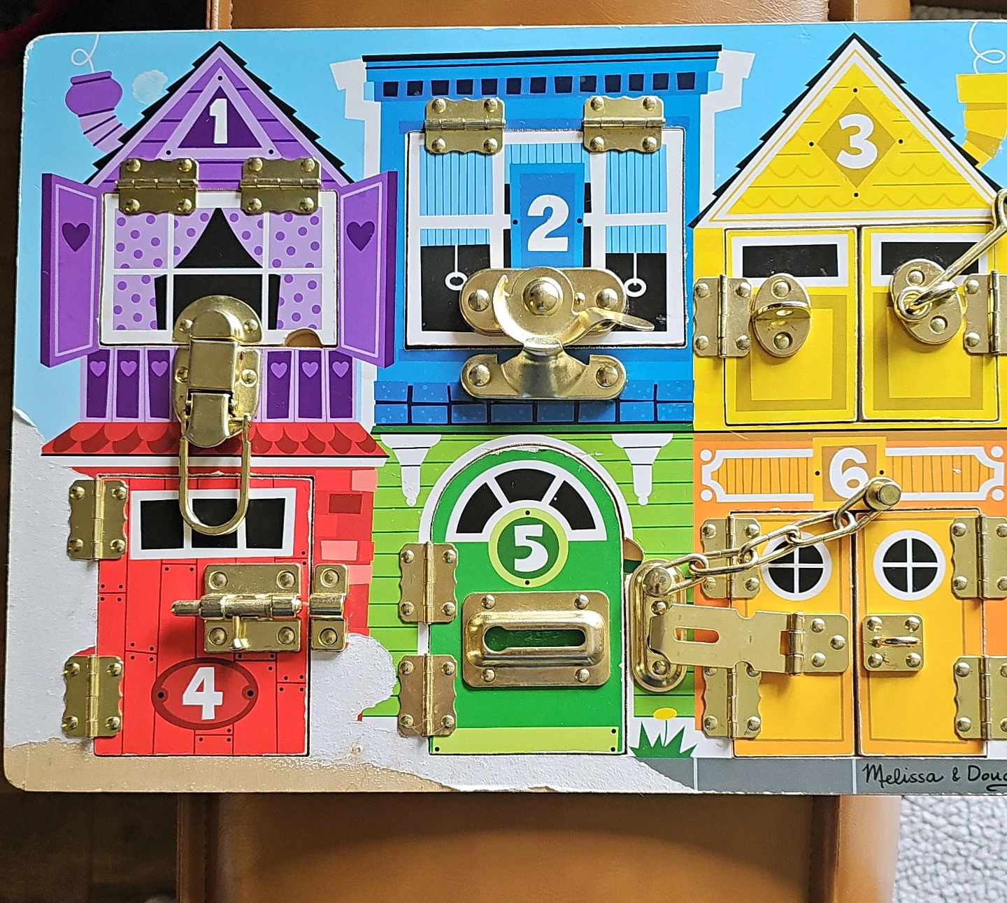 Melissa & Doug Wooden Activity Board Lock House