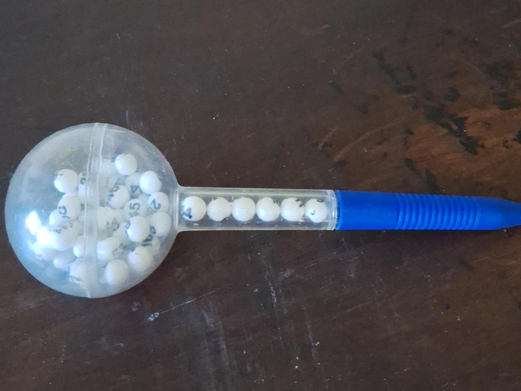 Clear Ballpoint Pen with Blue Barrel and Numbered Balls