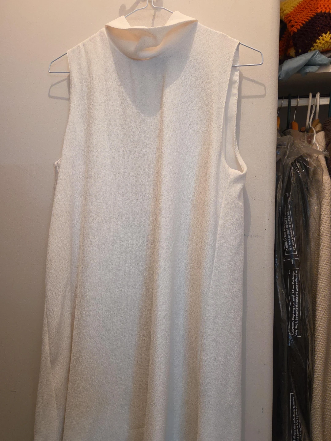 Sleeveless Mock Neck Blouse