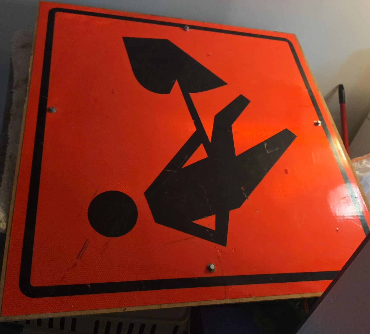 Orange Road Work Sign - Man with Shovel Symbol