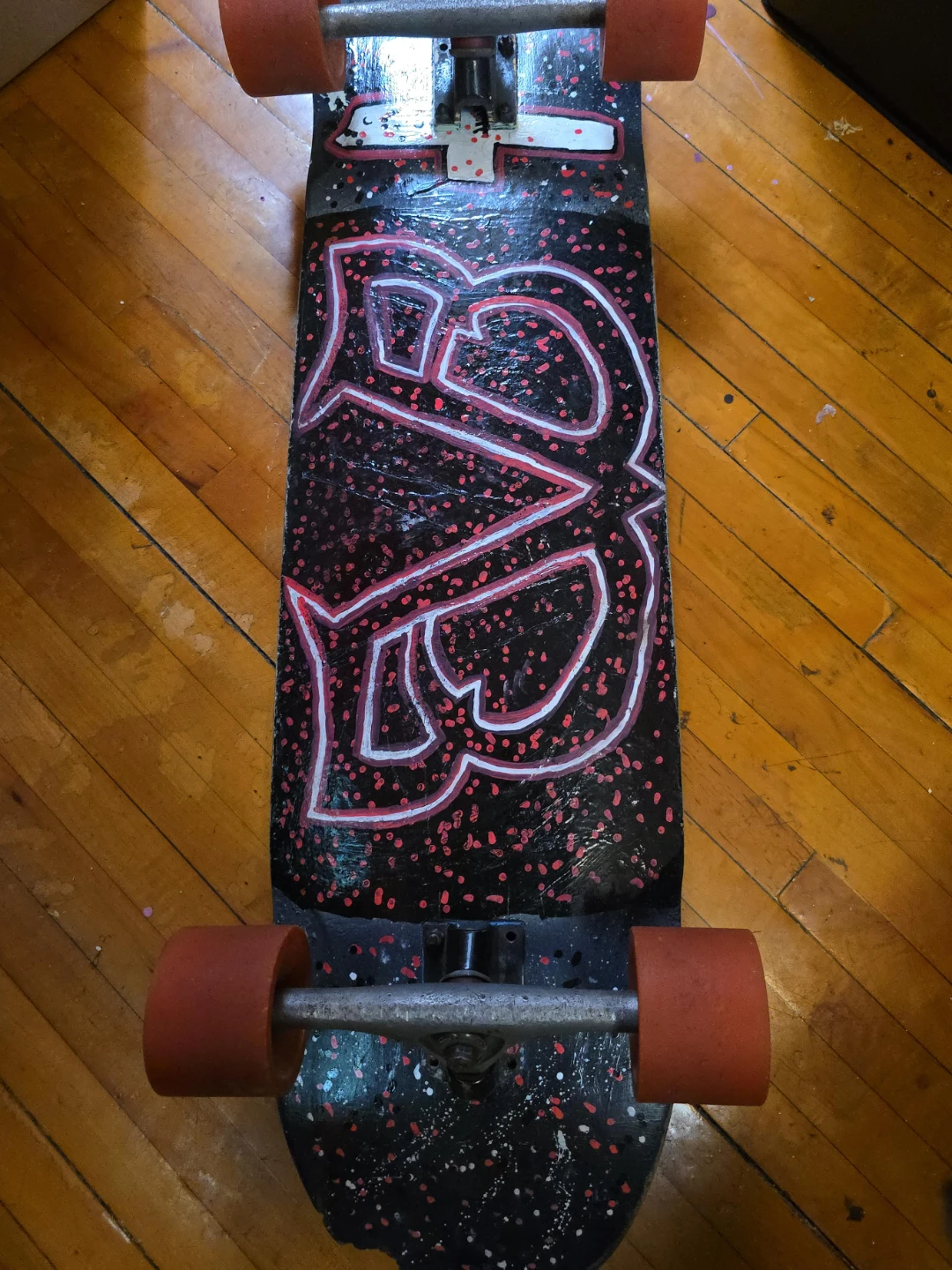 Skateboard with Skull Helmet
