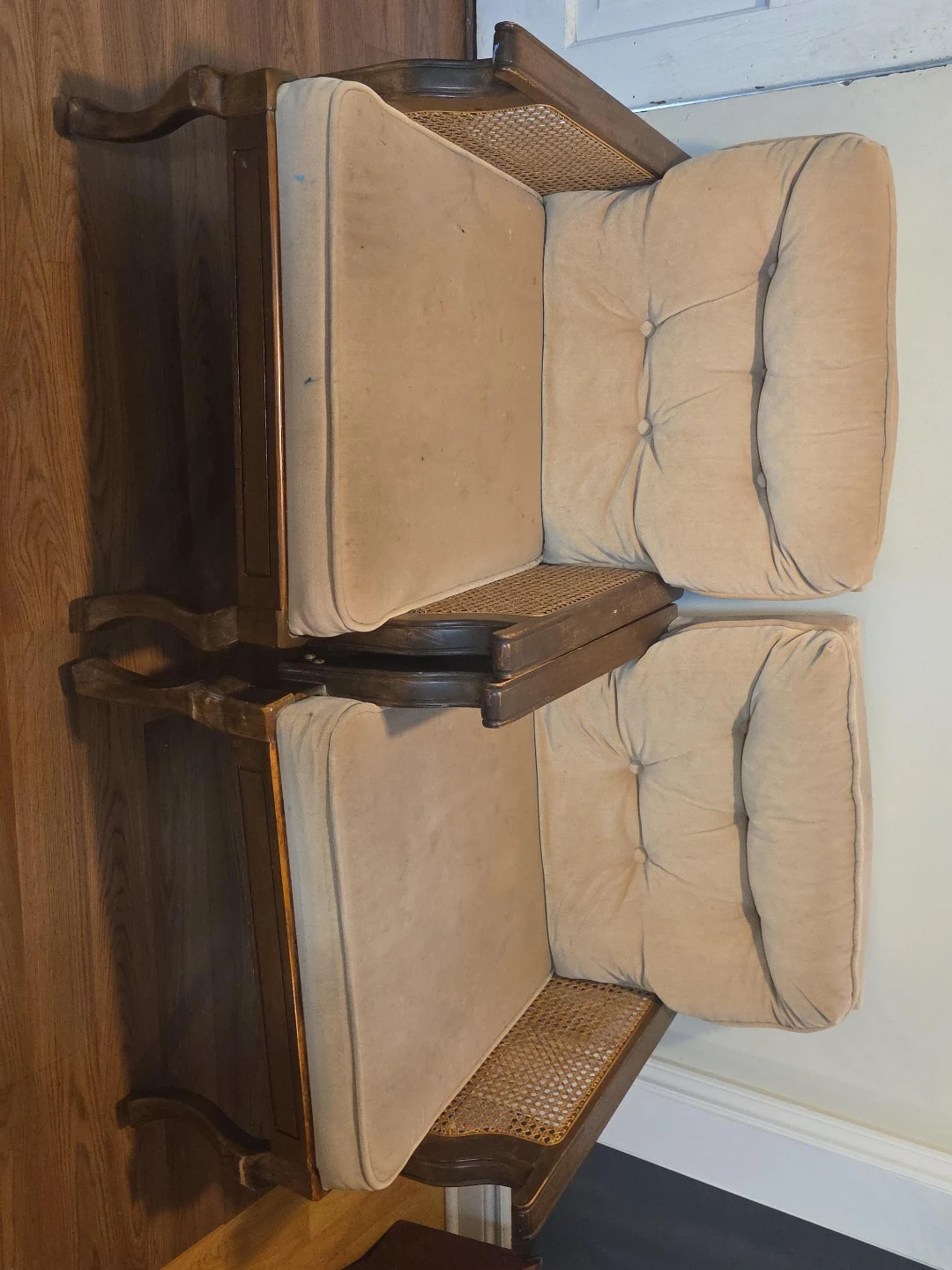 Pair of vintage accent chairs with cane backing