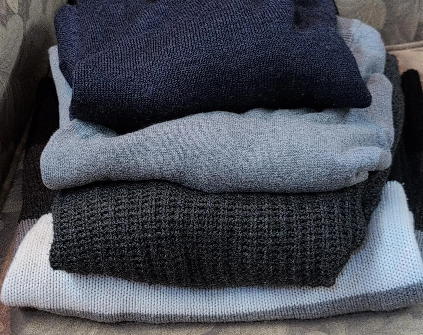 Stack of Men's Sweaters
