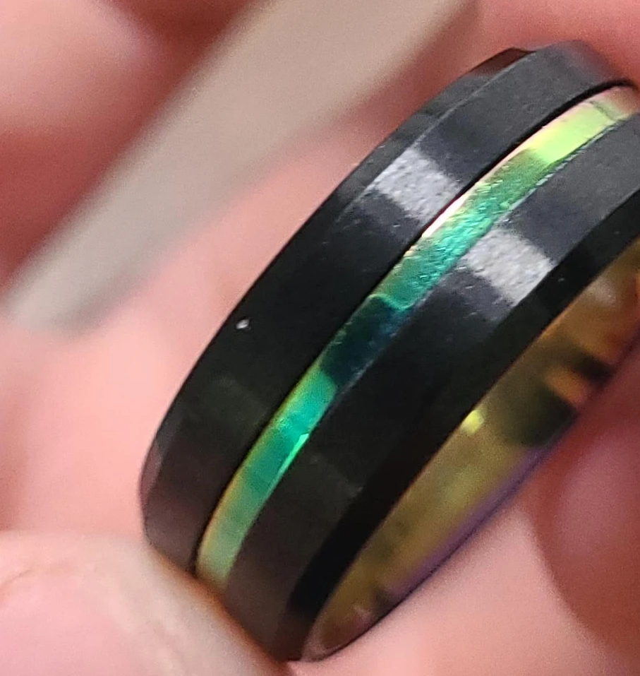 Black Ring with Green and Gold Accent