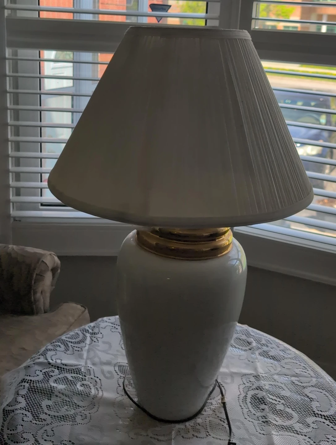 White ceramic table lamp with gold accent