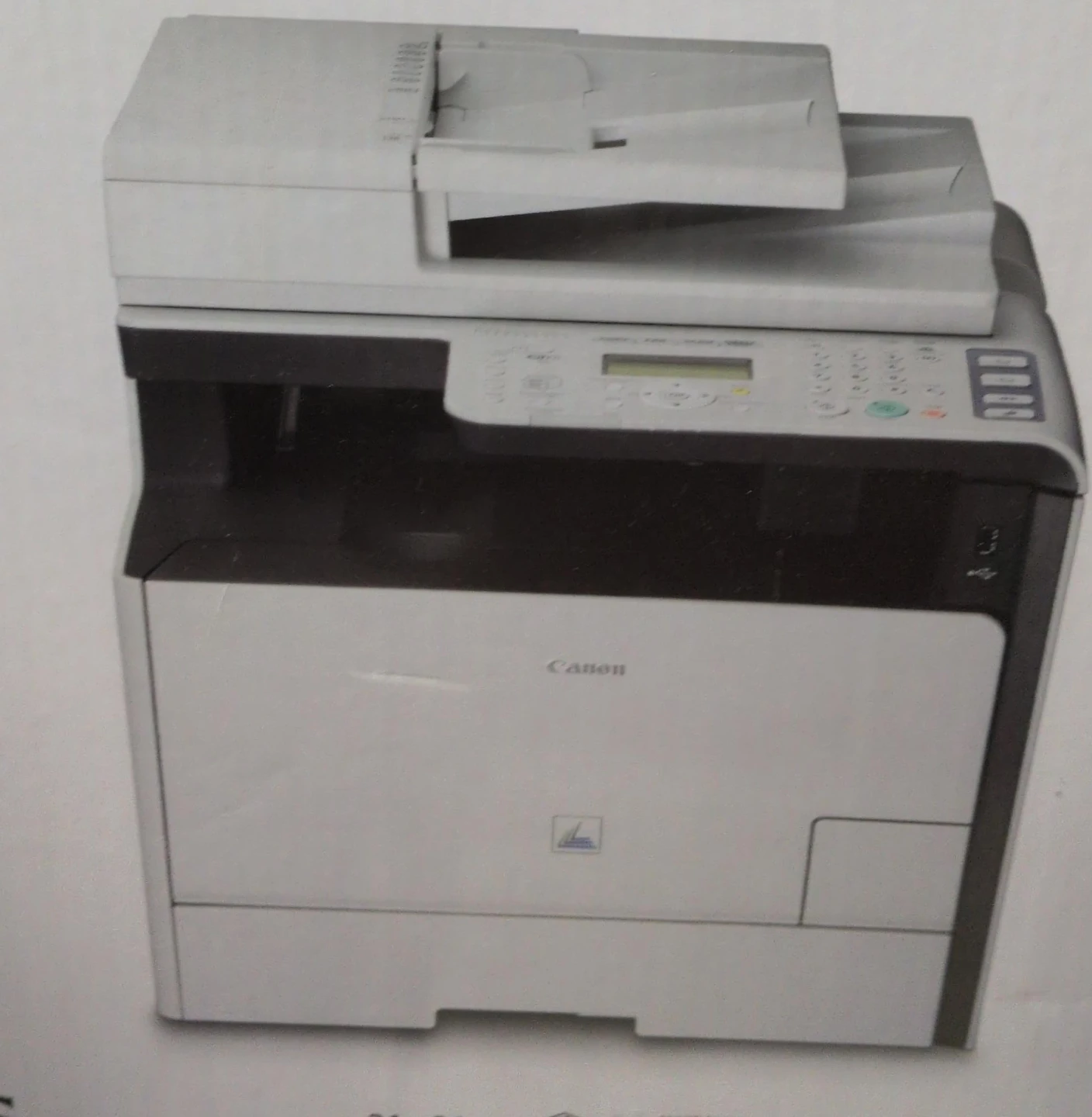 Canon 4-in-1 Laser Printer + 4 Genuine Canon Cartriges 118