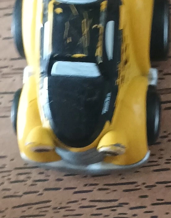 Yellow and Black Toy Car