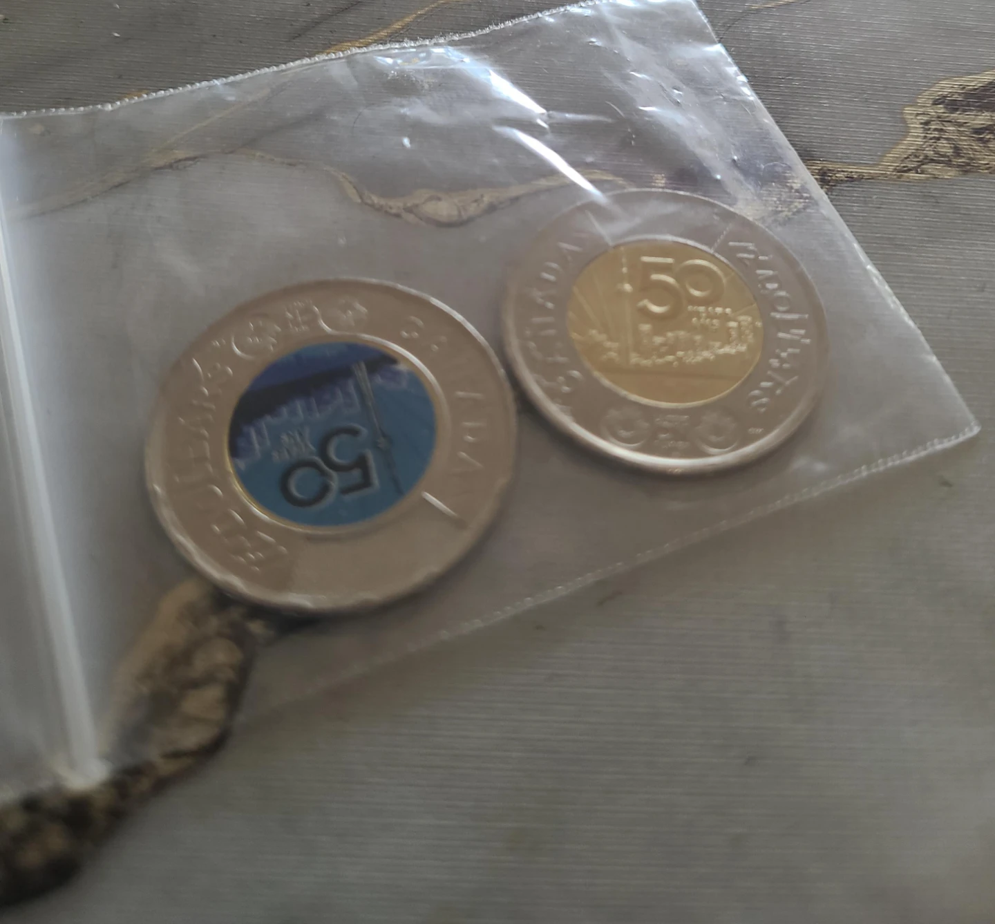 Two 2026 Canadian 50th Anniversary Commemorative Toonies